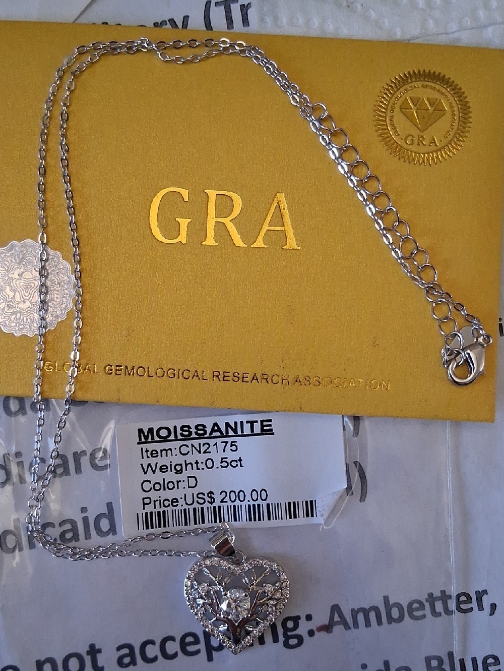 GRA Heart Moissanite Pendant Necklace in Silver Plate Over Stainless. Wont Tarni